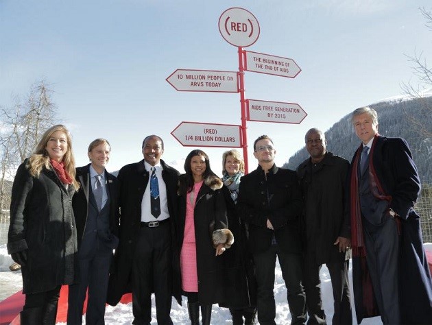 L-R: Deborah Dugan, CEO, (RED); Mark Dybul, Executive Director, The Global Fund to Fight AIDS, TB and Malaria; Patrice and Precious Motsepe; Anne Finucane, Bank of America; Bono, co-founder, (RED); President Mahama, Ghana; Bill McDermott, SAP. (RED) announces $10 million commitment from Bank of America to the Global Fund to fight AIDS, attracting matching funds from the Gates Foundation, SAP and the Motsepe family.  (RED) passes milestone of $250 million for the Global Fund.   (PRNewsFoto/(RED))