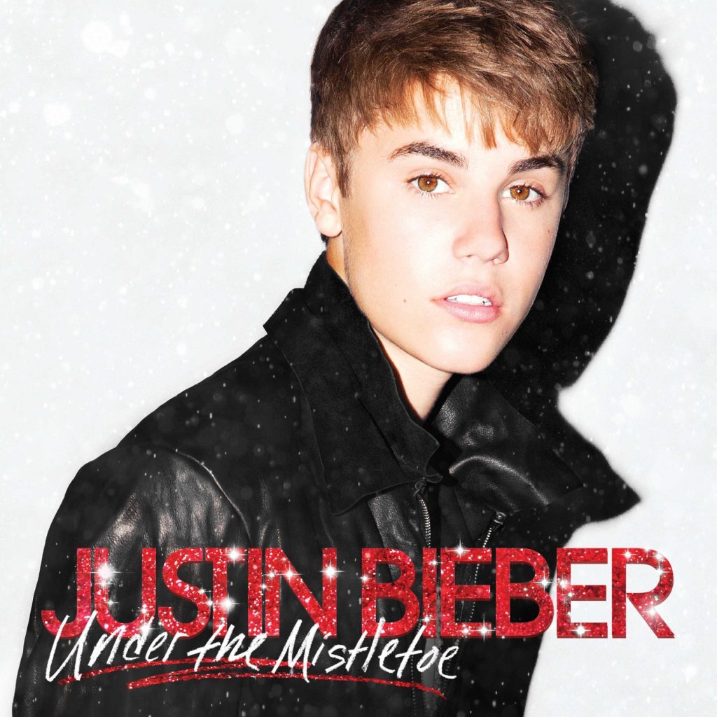 Justin Bieber's Christmas classic, 'Under The Mistletoe,' is now available on vinyl for the first time ever, just in time for the holidays. Originally released in 2011 as Bieber's second studio album, the 11-track LP is pressed on standard black vinyl and comes inside a jacket with a matte finish and 12-page booklet. The album showcases Bieber's unique spin on holiday standards alongside original songs and features Usher, Mariah Carey, Boyz II Men, The Band Perry and Busta Rhymes. (PRNewsFoto/Universal Music Enterprises)